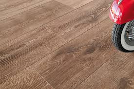 To cut down cost, under counter flooring can be little sturdy,low cost but must be str. Laminate Flooring European Cabinets Design Studios