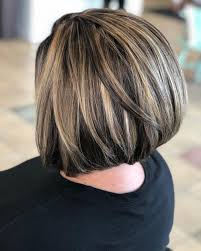 An underneath blonde streak softly appearing from short black bob. Top 9 Black Hair With Blonde Highlights Ideas In 2020
