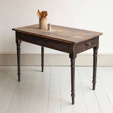 An Early Heal Sons Ebonised Side Or Kitchen Table With Beautifully Faded Pine Top Over A Single End Drawer Bearing Th Table Kitchen Table Rustic Dining Table
