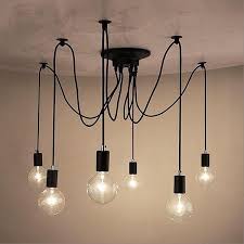 Wooden base iron cage hanging nordic lamp — sale price $142. The Warmly Spider Chandelier Veux Decor
