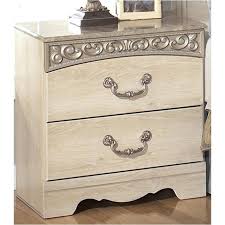 This piece of bedroom furniture is simply exquisite in crisp white with elements of french provincial style. B196 92 Ashley Furniture Two Drawer Night Stand