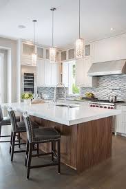 Pendant Lights Over Modern White Kitchen Island Modern White Kitchen Island White Modern Kitchen Kitchen Renovation Cost
