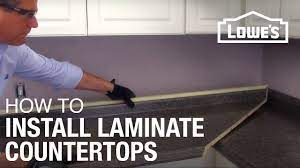 Measure the width of the build down stick next to the endcap located on the underside of the countertop use the pad of your finger to secure the tape to the underside of the countertop as shown in the 1st image. How To Install Laminate Countertops Youtube