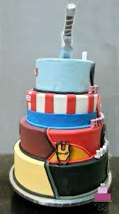 A modern design chocolate cake covered by chocolate mousse and coco spray. Superhero Birthday Cake An Awesome Tutorial Decorated Treats
