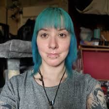 This is ma faded Directions Alpine Green mixed wi Apple Green and I was  gonna bleach roots and go Plum today and wondered if I would have to bleach  the whole lot