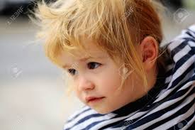 So you get the best of both worlds. Cute Baby Boy Child With Curly Blond Hair And Brown Eyes In Striped Stock Photo Picture And Royalty Free Image Image 64986622