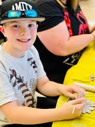 TigerTales: Recently, Ellen Hagan '97 and Eric King '96 returned to the  stage at Bardstown High School. The two reunited