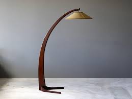 Think of this like a modern reading light, where you have the light coming directly overhead but it's still super dramatic and sculptural by itself. Large Modernist Curved Floor Lamp Walnut Brass Fabric Italy 1940s For Sale At 1stdibs
