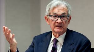 Powell sees tariffs raising inflation and says Fed will wait before further  rate moves