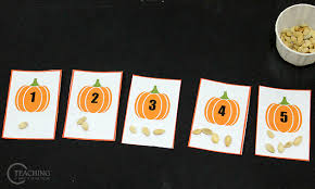 The children love observing their pumpkin, measuring their pumpkin, and scooping out students will start the pumpkin math activity by first measuring the outside of the pumpkin. Simple Preschool Pumpkin Math Activity With Free Printable Cards