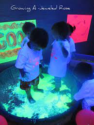 · light table activities and black light activities for toddlers and preschoolers. Blacklight Themed Group Sensory Play This Post Is Loaded With Sensory Play Ideas Sensory Play Kids Playing Activities For Kids