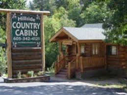 Our cabins have a covered porch, a/c, satellite tv, charcoal grill and picnic areas. Hillside Country Cabins Visit Hill City Sd