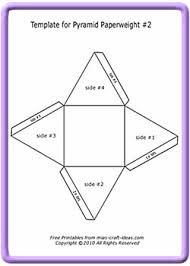 Below the top card, you'll place a pair of cards forming a triangle. Make A Pyramid Paperweight