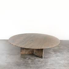 This sculptured coffee table is an extremely well crafted design with classic lines and an elegant presence. Solid Marble Coffee Table 1990s 158749