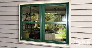 Two Double Hung Windows Mulled Together Feature Colonial Grids Hunter Green Exterior Color P Painting Vinyl Windows Vinyl Replacement Windows Windows Exterior