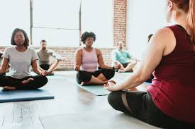 Download Premium Image Of People Meditating In A Yoga Class 1225097 Meditation Photos Yoga Class Meditation Class