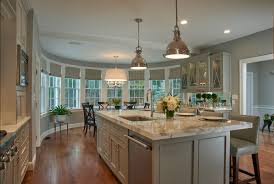 Design by rachel tingley with village home custom rustic alder cabinetry from our four acre amish cabinetry line is stained in a saddle finish and accented kitchen island and hutch are. Product Lines Great Northern Cabinetry