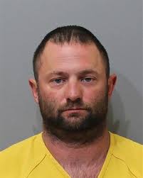 Man charged with attacking girlfriend in woods