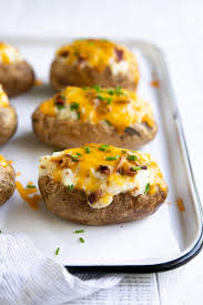 Next time you have leftover chili in the fridge make it a baked potato topper with all the fixin's! Easy Twice Baked Potatoes Recipe The Forked Spoon