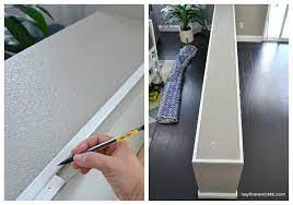 The easy way to cover an unsightly knee or pony wall using wood. How To Cap A Half Wall With Inexpenisve Wood