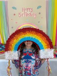 How cool is this rainbow swirl lollipop cake?! Rainbow Themed Party Ideas For 2021 Parties Made Personal