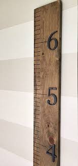 a modern rustic growth chart ruler is the perfect accessory