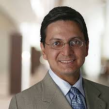 CC Names 8 New Trustees, Physics Professor Promoted