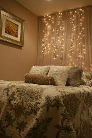 White Lights And Tulle Hung As A Backdrop Behind Your Bed Add A Touch Of Romance And Magic White Lights Bedroom Behind Bed Decor Guest Room Decor
