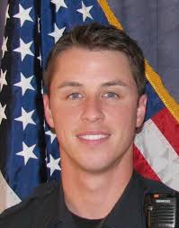 Boulder police officer who confronted black Naropa student to resign