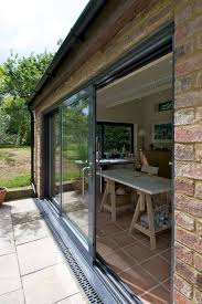 Gallery Of Bi Folding Doors Sliding Doors Skylights Aluminium Bi Folding Exterior Doors Modelos De Puertas Puertas Exterior Puertas Corredizas De Vidrio
