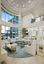 Stunning Floor To Ceiling Windows In This Gorgeous Two Story Living Room At Frenchman S Harbor Fl Formal Living Room Designs House Design Dream Living Rooms