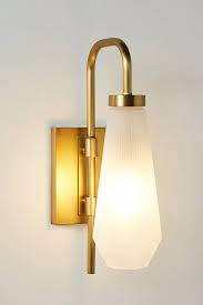 The Edit Proper With A Twist Anthropologie Sconces Unique Lighting Sconce Lighting