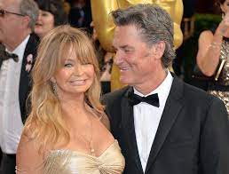 The actor also opened up about their family traditions during the holidays and revealed that they all look forward to christmas every year. Kurt Russell And Goldie Hawn Watching Overboard Movie Popsugar Celebrity