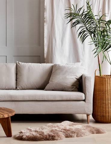 Light linen look sofa in a bright Mauritius living room
