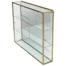 Although shot glass display cases are meant to display shot glasses, you can still display other things based on your own preferences. Large Solid Brass Frame Square Hanging Wall Unit Display Case Shelves Unit At 1stdibs