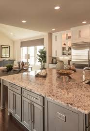 A Couple Of Green Elements To Liven Up This Kitchen Beige Kitchen Granite Countertops Kitchen Taupe Kitchen Cabinets