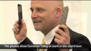 Tattooed prosecutor: Varied and textured background helps with jurors