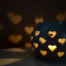 Once lit the candleholder will emit a calming amber color heating the salt with a tea light candle releases negative ions into the air. Grey Heart Cut Out Tealight Holders 2 Pack George At Asda