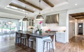 I installed faux wood ceiling beams and put faux shiplap planks over my popcorn ceiling as part of my living room makeover. Great Ways To Incorporate Shiplap Into A Cozy Home