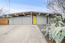 Glass surrounds every room you enter with full. Photo 1 Of 19 In A Radiant Bay Area Eichler With A Bright Yellow Door Asks 875k Dwell