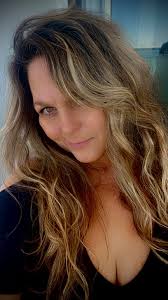 What hairstyle recommendations are suitable for a 52-year-old woman?