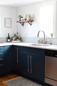 Meredith Michael S 18th Century Kitchen Gets A Put Together Feeling Modern Grey Kitchen Diy Kitchen Cabinets Blue Kitchen Cabinets