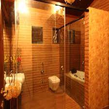 Below are some examples of how tiles can be used to achieve specific design effects in small bathrooms: Small Bathroom Tile Ideas For Indian Homes Homify