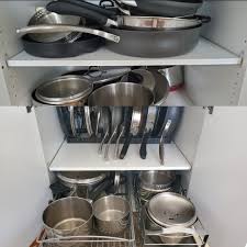 Pots and pans cabinet organizer. Pots And Pans Before And After Organization