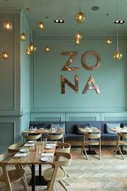 Brass Details Mint Paint And Bold Lighting Design Interieur Restaurant Design De Magasin De Cafe Interieur De Restaurant