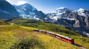 Train In The Swiss Alps Top Places To Travel Places To Travel Tourism Day