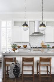 gray kitchen boasts wood counter stools