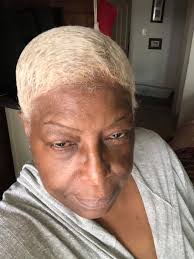 How to hide hair and keep a wig on?