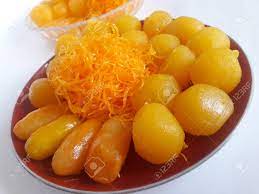 Egg yolks, water, cinnamon stick, dark brown sugar, milk, ground almonds and 1 more. Thai Dessert Tong Yord And Foi Tong And Med Khanoon Egg Yolk Stock Photo Picture And Royalty Free Image Image 100347494
