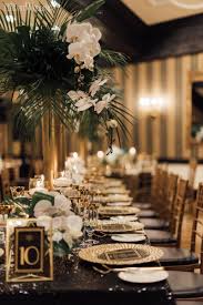 Palm And Orchid Centrepiece Tall Wedding Centrepieces Old Hollywood Wedding Table S In 2020 Gatsby Wedding Theme Wedding Table Themes Wedding Table Decorations Vintage